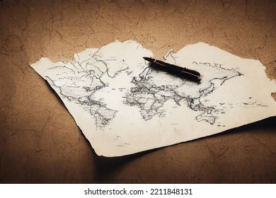 Vintage And Antique Background With Old Torn World Map Paper