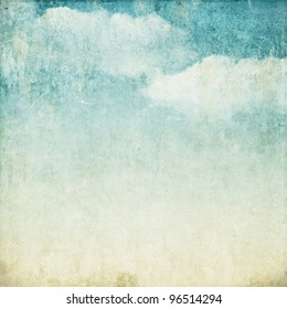 Vintage background in the blue shade with clouds