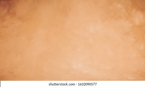 Vintage beige artistic canvas backdrop. Abstract stained background. 16x9 banner.