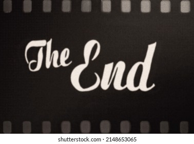 A Vintage Old Fashioned The End Title, Silent Movie Ariston Style (retrograded), Over A Film Strip.
