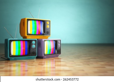 Vintage television concept. Stack of retro tv set on green background. 3d