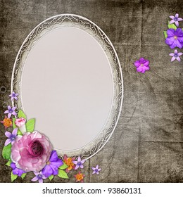 Vintage textured background with a frame for the photo or text and with flowers