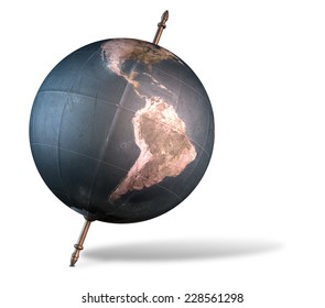 A Vintage World Globe Tilted And Standing On A Central Axis On An Isolated White Background