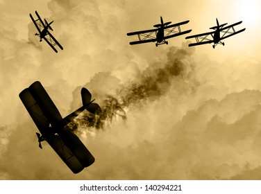 Vintage World War One Biplanes And Engaged In A Dog Fight  In A Cloudy Sky. One Had Success In Shooting Down The Enemy Plane. Original Illustration Image.