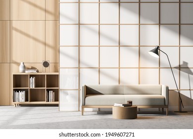 Waiting Room Interior With Comfortable Couch, Lamp, Paper Partition, Bookcase, Concrete Floor, Bookcase. Concept Of Cozy Meeting Place. Scandinavian Minimalist Design. 3d Rendering