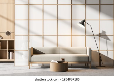 Waiting Room Interior With Comfortable Couch, Lamp, Paper Partition, Bookcase, Concrete Floor, Bookcase. Concept Of Cozy Meeting Place. Scandinavian Minimalist Design. 3d Rendering