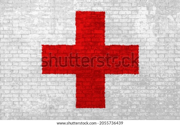 Wall of bricks painted\
with the Red Cross in 3D background. Concept of social barriers of\
healthcare, divisions, and urban conflicts. Symbol of hospital and\
first aid.