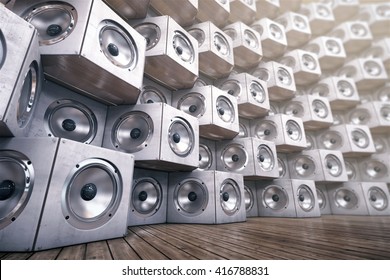 Wall Of Musical Speakers On A Wooden Background