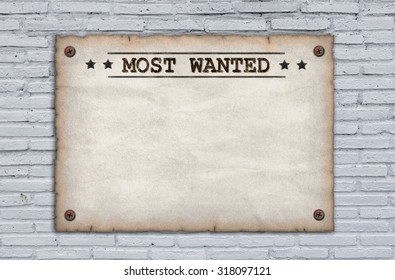 Wanted Dead Or Alive Grungy Faded Posters On Brick Wall