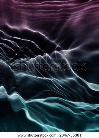 Closeup​ blur​ abstract​ of​ surface​ blue​ water. Abstract​ of​ surface​ blue​ water​ reflected​ with​ sunlight​ for​ background.Top​ view​ of blue​ water.​ Water​ splashed​ abstract​ background.