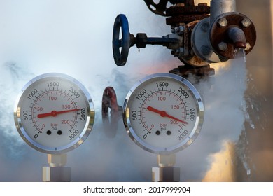 Water Pressure Gauge Meters Against A Leaky Pipeline Which Comes Out Hot Steam And Hot Water Under .3D Illustration.