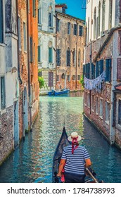 Watercolor Drawing Of Gondola Sailing Narrow Canal In Venice Between Old Buildings With Brick Walls. Gondolier Dressed Traditional Clothes And Boater Straw Hat With Red Ribbon.