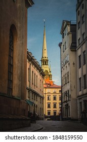 Watercolor Drawing Of Traditional Typical Sweden Narrow Cobblestone Street, Colorful Buildings In Old Historical Town Gamla Stan Of Stadsholmen Island, Spires Lutheran German Church, Stockholm