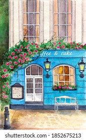 Watercolor Illustration Of A Cozy Blue Coffee Shop With A Rose Climbing The Wall And A Small Bench In Front Of It