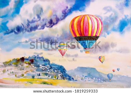 Watercolor landscape painting colorful of tourism family in hot air balloon on mountain village and blue sky cloud and meadow with wallpaper or postcard paint background. 