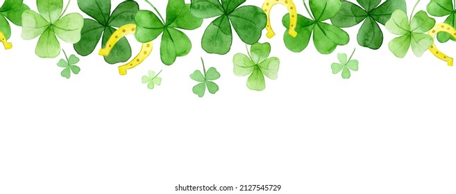 watercolor seamless border on it st patrick's day. green four-leaf clover and golden horseshoes. web banner, frame