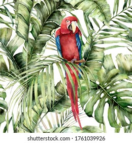Watercolor tropical seamless pattern with red parrot and palm leaves. Hand painted birds and jungle tree leaves. Floral illustration isolated on white background for design, print or background.