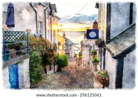 Watercolour painting of narrow cobbled streets lined with cottages on a steep hill at Clovelly on the Devon coast