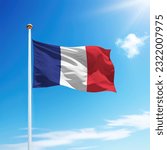 Waving flag of France on flagpole with sky background. Template for independence day