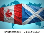 Waving Scottish and Canadian flags of the political map of the world