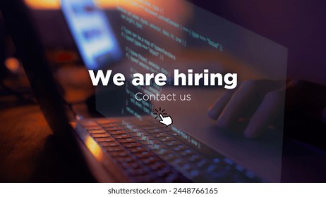 we are hiring, programmer working on his computer