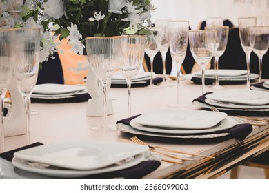 Wedding table setup with glasses for guests 