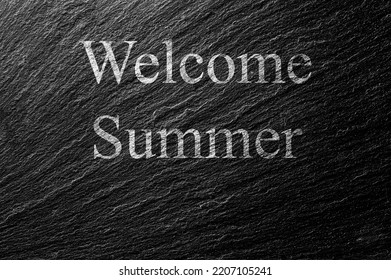 Welcome Summer Chalk Text On Black Stone Slab