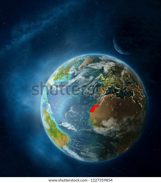 Western Sahara from space on Earth surrounded by\
space with Moon and Milky Way. Detailed planet surface with city\
lights and clouds. 3D illustration. Elements of this image\
furnished by\
NASA.