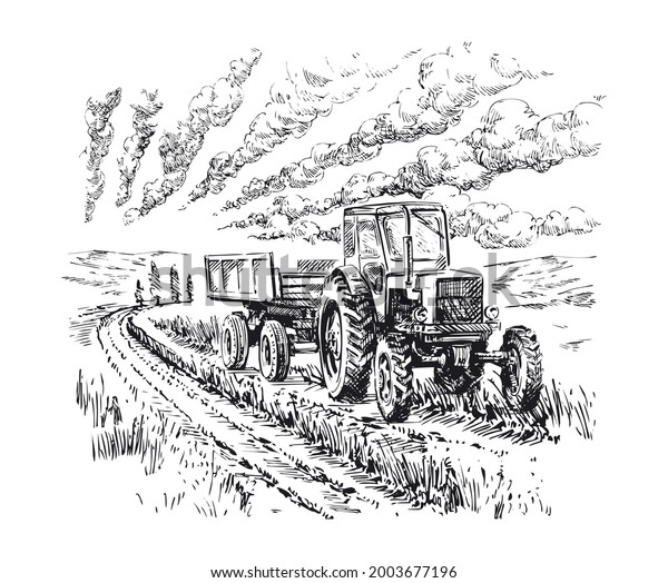 Wheeled tractor with\
trailer in the\
field
