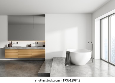 White Bathroom Interior With Concrete Floor And Podium Near Window, Side View. Minimalist Light Room With Modern Furniture, 3D Rendering No People