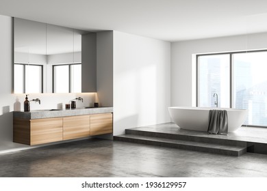 White bathroom interior with concrete floor, white bathtub and two sinks, side view. Minimalist bathroom with modern furniture and city view, 3D rendering no people