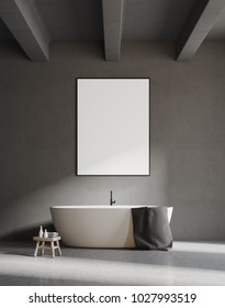 White bathtub standing on a concrete floor of a bathroom with gray walls. A vertical framed poster. Concept of minimalism. 3d rendering mock up