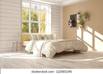 White bedroom with autumn landscape in window. Scandinavian interior design. 3D illustration - Shutterstock ID 1225831390