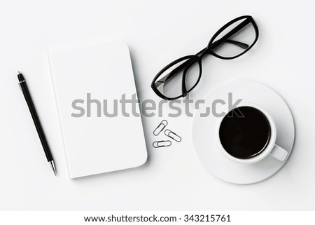 White blank diary cover, cup of coffee and glasses on white table, mock up 3D Render