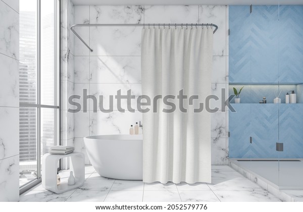 White and blue\
bathroom interior design, using a galss shower cabin, a niche\
shelf, a tub with a curtain, a side table and floor and wall tiles.\
A concept of a modern\
apartment.