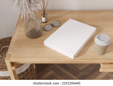 White Book Cover Mock Up With Coffee Cup, Vase And Other Home Accessories On Wooden Table. Blank Template For Your Design. Top View, Close-up. Book, Catalogue Cover Presentation. 3D. 3D Illustration