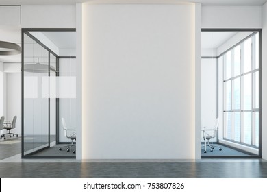 White Brick Open Space Office Interior With A Concrete Floor, A Blank Wall Fragment And A Row Of Computer Desks Along The Wall. Close Up 3d Rendering Mock Up