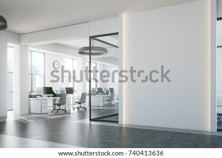 White brick open space office interior with a concrete floor, a blank wall fragment and a row of computer desks along the wall. Side view. 3d rendering mock up ストックフォト © 