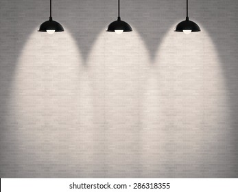 white brick wall with three hanging lanterns