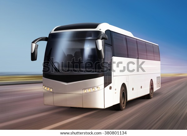 white bus moves on divided\
highway