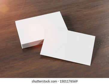 White Business Card Pile On Wooden Desk Mockup 3d Rendering