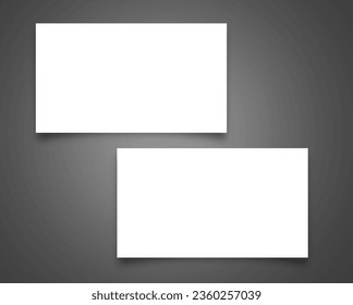 A white business card sits on a grey background providing ample copy space for your custom text - Powered by Shutterstock