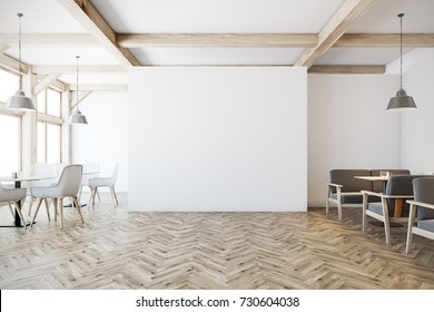 White Cafe Interior With Tall Windows, A Wooden Floor, Gray Sofas, Square Tables And White And Wooden Chairs. A Blank Wall. 3d Rendering Mock Up