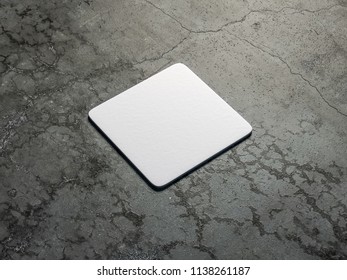 White Cardboard Square Beer Coaster Mockup On The Concrete Floor. 3d Rendering