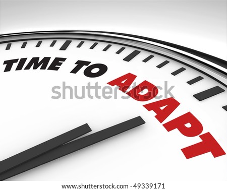 White clock with words Time to Adapt on its face
