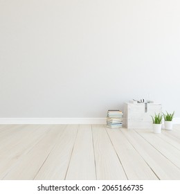 White empty minimalist room interior with dresser on a wooden floor, decor on a large wall, white landscape in window. Background interior. Home nordic interior. 3D illustration - Shutterstock ID 2065166735