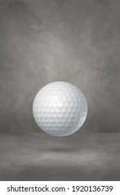 White Golf Ball Isolated On A Concrete Studio Background. 3D Illustration