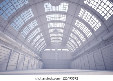 White Hangar With Bright Sky Coming Trough The Ceiling