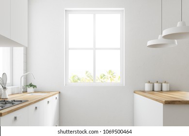 White kitchen corner with a wooden floor, large windows and white countertops and cupboards. A side view 3d rendering mock up