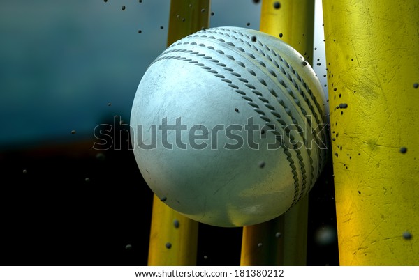 A
white leather stitched cricket ball hitting yellow wooden wickets
with dirt particles emanating from the impact at
night